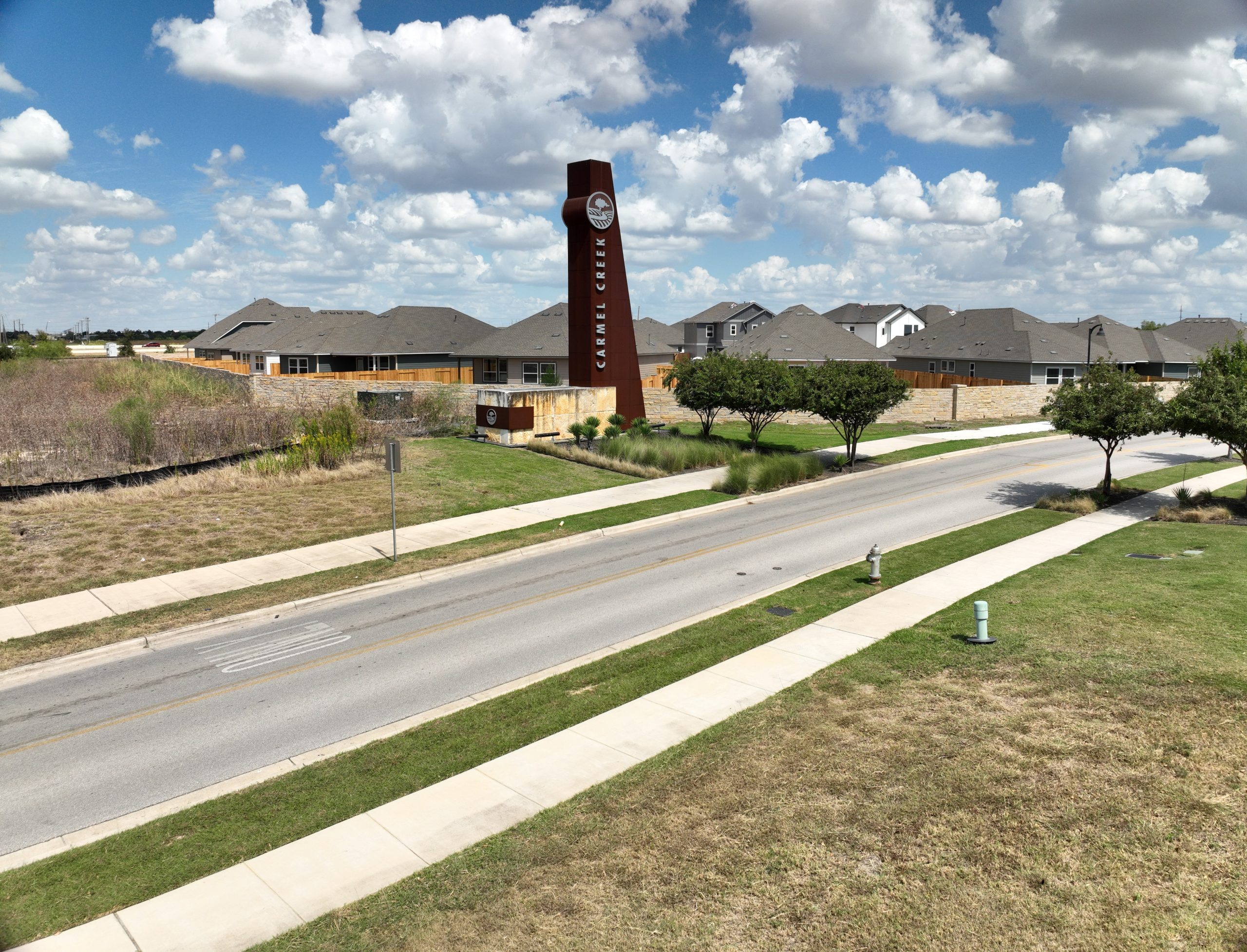 A monument sign outside of a build-to-rent community